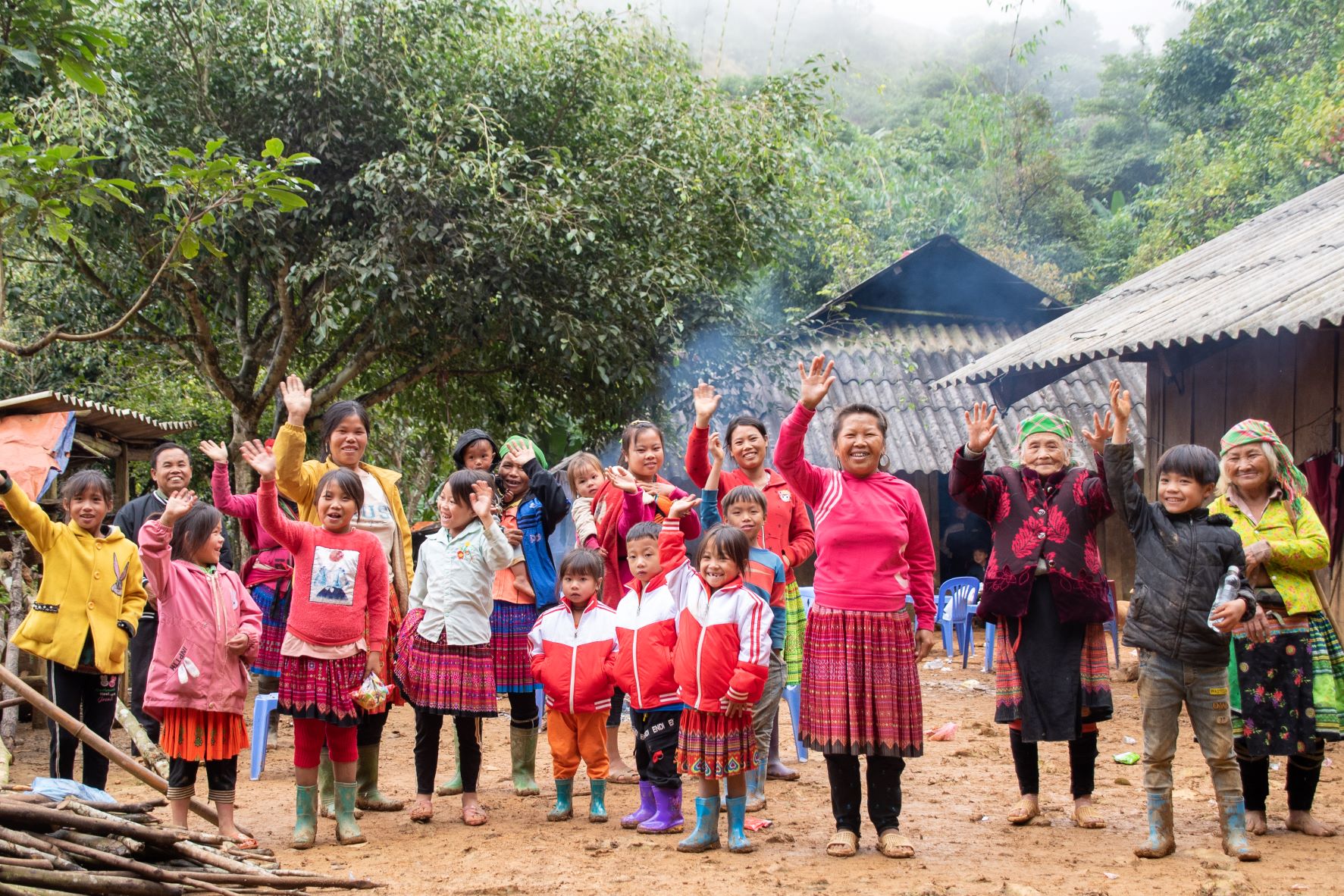 Villagers waving good bye